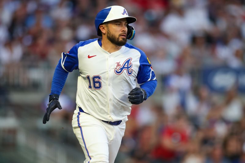 Aug 3, 2024; Atlanta, Georgia, USA; Atlanta Braves catcher Travis d'Arnaud (16) hits a single against the Miami Marlins in the third inning at Truist Park. Mandatory Credit: Brett Davis-USA TODAY Sports
