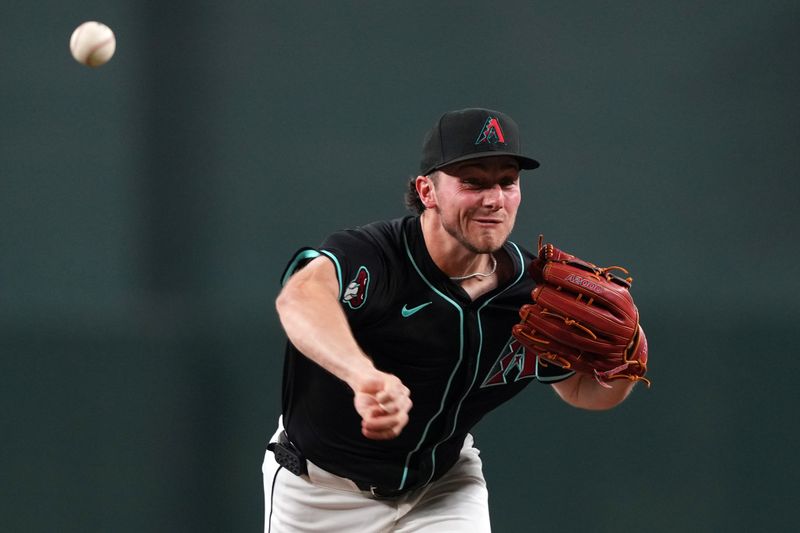 May 4, 2024; Phoenix, Arizona, USA; Arizona Diamondbacks pitcher Brandon Pfaadt (32) pitches against the San Diego Padres during the third inning at Chase Field. Mandatory Credit: Joe Camporeale-USA TODAY Sports