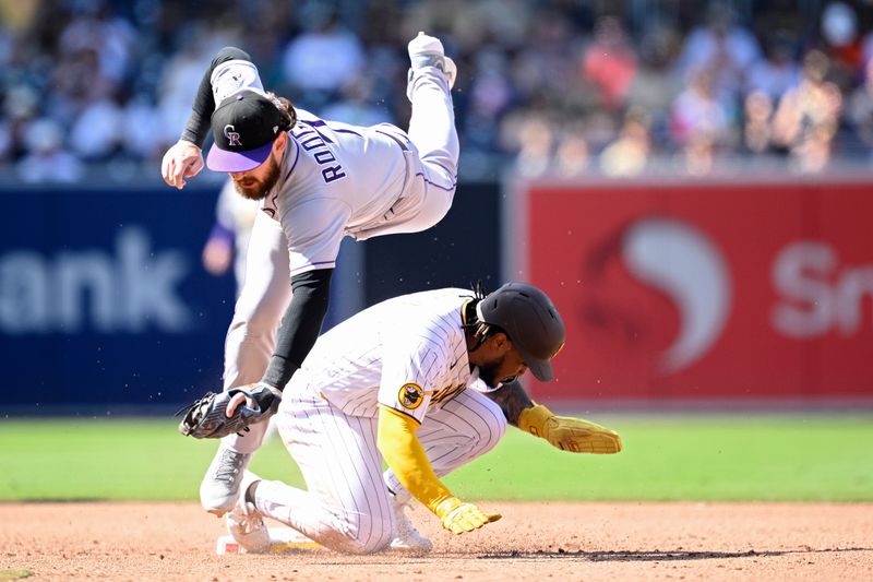 Sep 20, 2023; San Diego, California, USA; Colorado Rockies second baseman Brendan Rodgers (7) forces out San Diego Padres third baseman Eguy Rosario (5) at second base during the sixth inning at Petco Park. Mandatory Credit: Orlando Ramirez-USA TODAY Sports