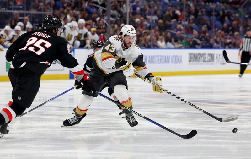 Mar 2, 2024; Buffalo, New York, USA;  Vegas Golden Knights center Paul Cotter (43) makes a pass as Buffalo Sabres defenseman Owen Power (25) defends during the third period at KeyBank Center. Mandatory Credit: Timothy T. Ludwig-USA TODAY Sports