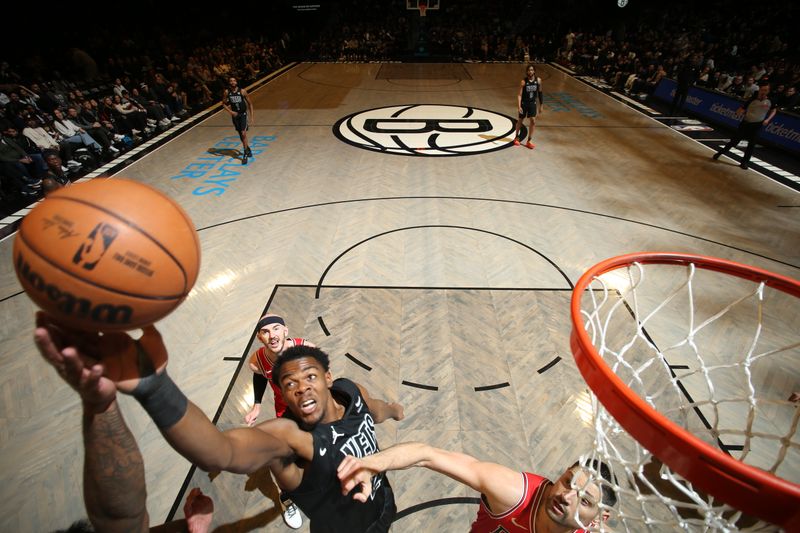 BROOKLYN, NY - MARCH 29: Day'Ron Sharpe #20 of the Brooklyn Nets drives to the basket during the game against the Chicago Bulls on March 29, 2024 at Barclays Center in Brooklyn, New York. NOTE TO USER: User expressly acknowledges and agrees that, by downloading and or using this Photograph, user is consenting to the terms and conditions of the Getty Images License Agreement. Mandatory Copyright Notice: Copyright 2024 NBAE (Photo by Nathaniel S. Butler/NBAE via Getty Images)