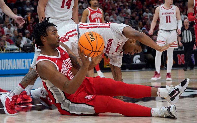 Mar 8, 2023; Chicago, IL, USA; Ohio State Buckeyes forward Brice Sensabaugh (10) and Wisconsin Badgers guard Kamari McGee (4) go for the loose ball during the second half at United Center. Mandatory Credit: David Banks-USA TODAY Sports