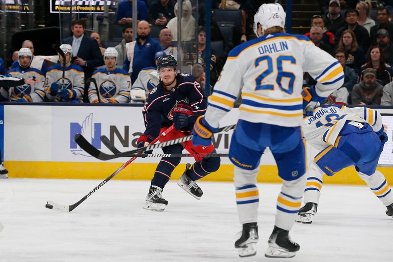 Feb 23, 2024; Columbus, Ohio, USA; Columbus Blue Jackets center Jack Roslovic (96) passes the puck against the Buffalo Sabres during the first period at Nationwide Arena. Mandatory Credit: Russell LaBounty-USA TODAY Sports