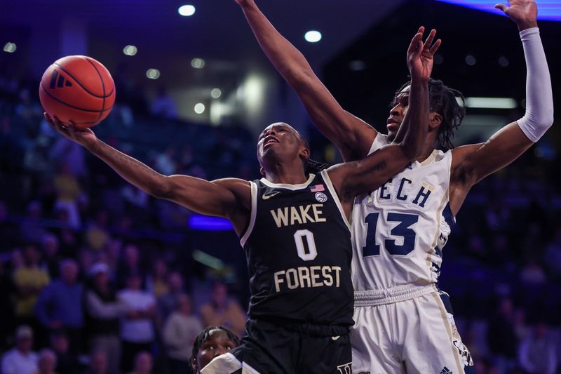 Feb 6, 2024; Atlanta, Georgia, USA; Wake Forest Demon Deacons guard Kevin Miller (0) shoots past Georgia Tech Yellow Jackets guard Miles Kelly (13) in the first half at McCamish Pavilion. Mandatory Credit: Brett Davis-USA TODAY Sports