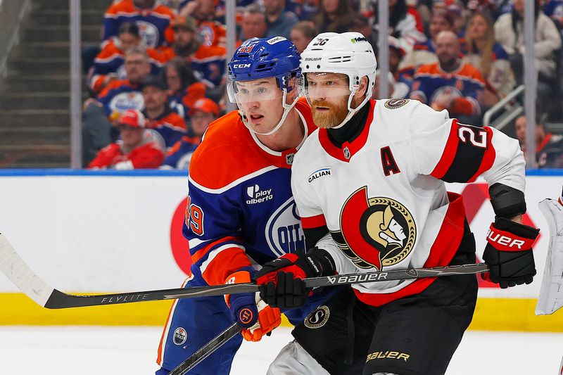 Mar 3, 2026; Edmonton, Alberta, CAN; Ottawa Senators forward Claude Giroux (28) and Edmonton Oilers defensemen Ty Emberson (49) battles for position during the second period at Rogers Place. Mandatory Credit: Perry Nelson-Imagn Images