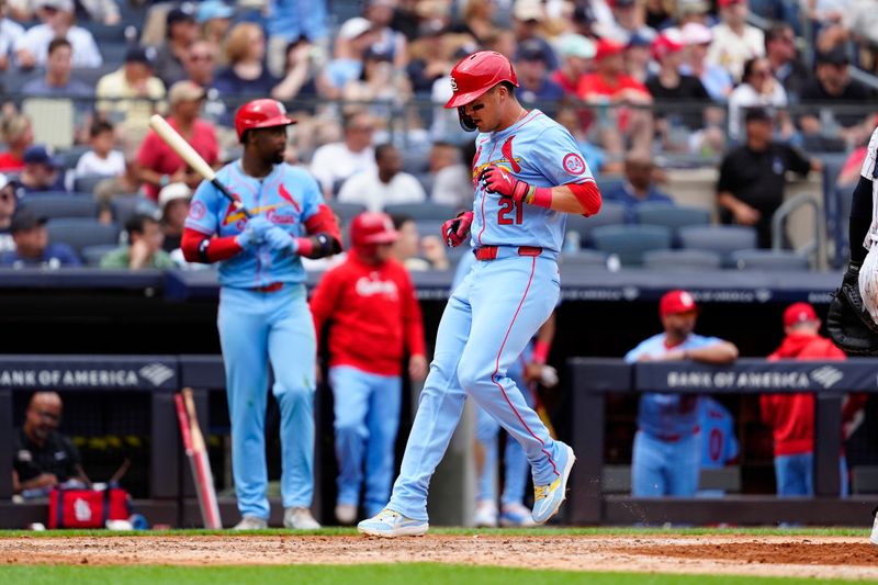 Aug 31, 2024; Bronx, New York, USA; St. Louis Cardinals left fielder Lars Nootbaar (21) scores a run on St. Louis Cardinals catcher Ivan Herrera (not pictured) RBI double against the New York Yankees during the sixth inning at Yankee Stadium. Mandatory Credit: Gregory Fisher-USA TODAY Sports
