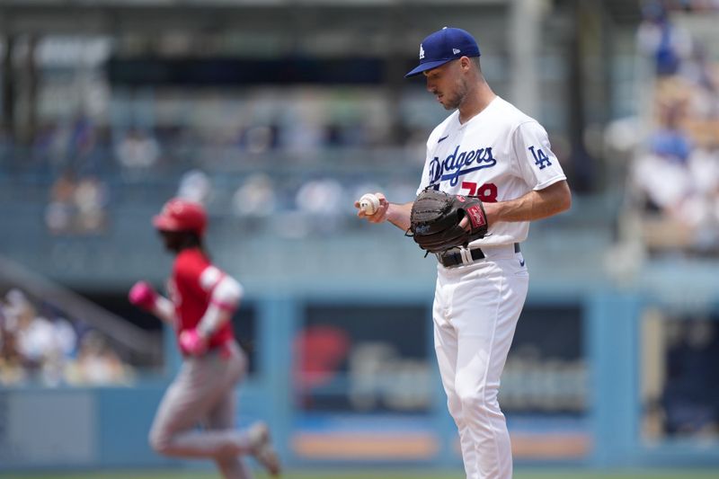 Jul 30, 2023; Los Angeles, California, USA; Los Angeles Dodgers starting pitcher Michael Grove (78) reacts after surrendering a home run to Cincinnati Reds third baseman Elly De La Cruz (44) in the first inning at Dodger Stadium. Mandatory Credit: Kirby Lee-USA TODAY Sports