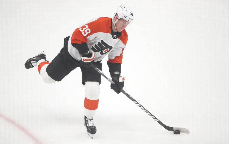 Feb 27, 2025; Pittsburgh, Pennsylvania, USA;  Philadelphia Flyers right wing Matvei Michkov (39) warms up against the Pittsburgh Penguins at PPG Paints Arena. Mandatory Credit: Charles LeClaire-Imagn Images