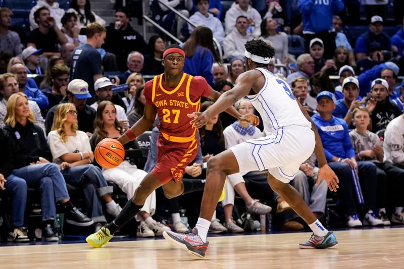 Feb 21, 2026; Provo, Utah, USA; Iowa State Cyclones guard Killyan Toure (27) controls the ball during the second half against the BYU Cougars at Marriott Center. Mandatory Credit: Aaron Baker-Imagn Images