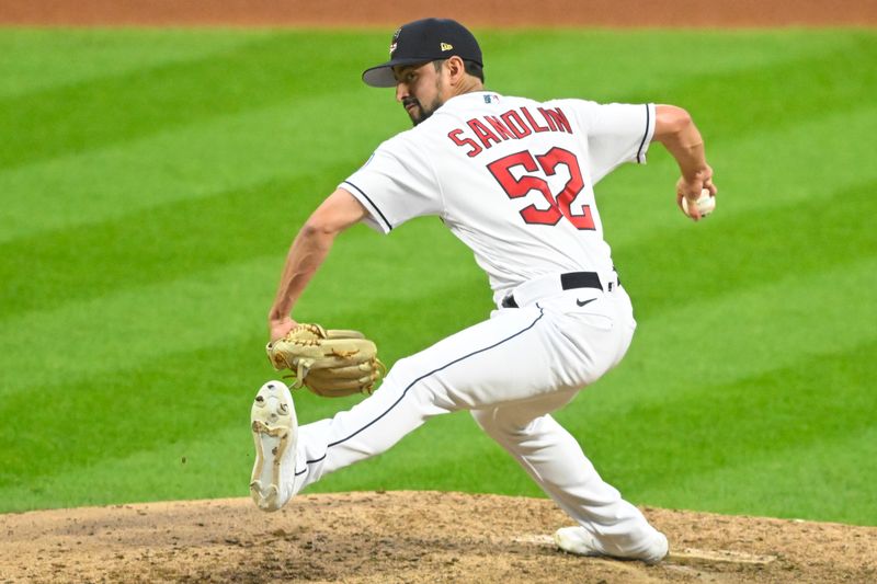 Jul 4, 2023; Cleveland, Ohio, USA; Cleveland Guardians relief pitcher Nick Sandlin (52) delivers a pitch in the seventh inning against the Atlanta Braves at Progressive Field. Mandatory Credit: David Richard-USA TODAY Sports