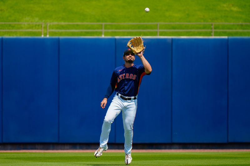 Mar 11, 2023; West Palm Beach, Florida, USA; Houston Astros outfielder Ross Adolph (91) catches a fly ball against the St. Louis Cardinals during the first inning at The Ballpark of the Palm Beaches. Mandatory Credit: Rich Storry-USA TODAY Sports