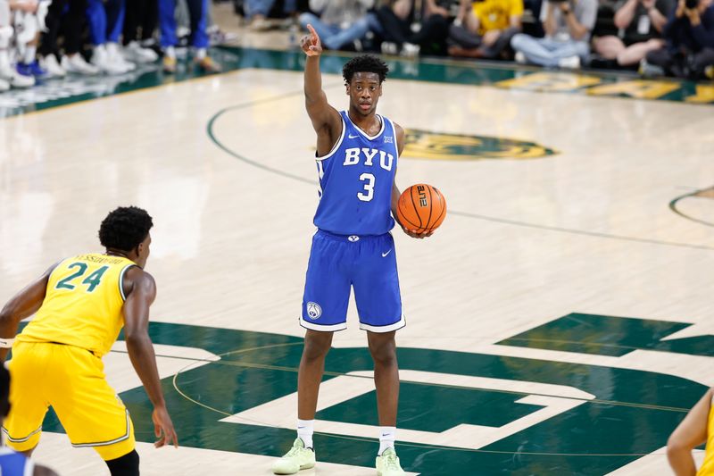Feb 10, 2026; Waco, Texas, USA;  BYU Cougars forward AJ Dybantsa (3) calls a play as Baylor Bears guard Tounde Yessoufou (24) defends during the first half at Paul and Alejandra Foster Pavilion. Mandatory Credit: Chris Jones-Imagn Images