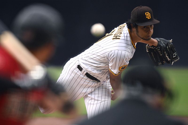 Aug 19, 2023; San Diego, California, USA; San Diego Padres starting pitcher Yu Darvish (11) throws a pitch against the Arizona Diamondbacks during the first inning at Petco Park. Mandatory Credit: Orlando Ramirez-USA TODAY Sports