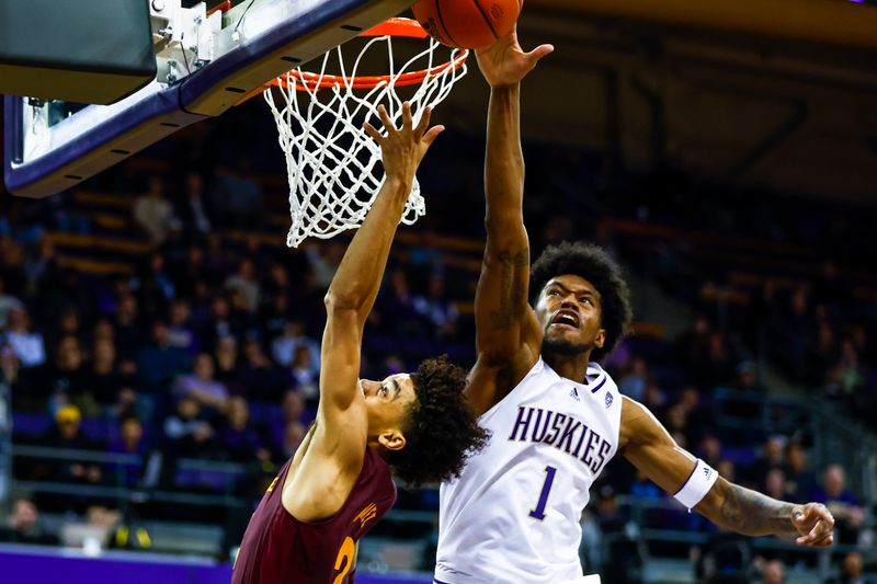 Jan 26, 2023; Seattle, Washington, USA; Washington Huskies forward Keion Brooks (1) blocks a layup attempt by Arizona State Sun Devils guard Austin Nunez (2) during overtime at Alaska Airlines Arena at Hec Edmundson Pavilion. Mandatory Credit: Joe Nicholson-USA TODAY Sports