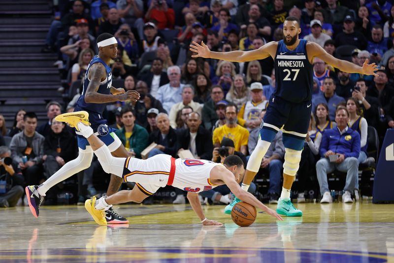 SAN FRANCISCO, CALIFORNIA - DECEMBER 08: Stephen Curry #30 of the Golden State Warriors falls to the floor after being fouled in the third quarter against the Minnesota Timberwolves at Chase Center on December 08, 2024 in San Francisco, California. NOTE TO USER: User expressly acknowledges and agrees that, by downloading and or using this photograph, User is consenting to the terms and conditions of the Getty Images License Agreement. (Photo by Lachlan Cunningham/Getty Images)