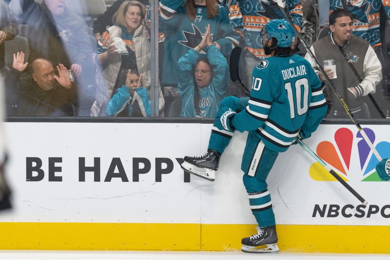 Dec 21, 2023; San Jose, California, USA; San Jose Sharks left wing Anthony Duclair (10) reacts after scoring a goal during the second period against the Arizona Coyotes at SAP Center at San Jose. Mandatory Credit: Stan Szeto-USA TODAY Sports