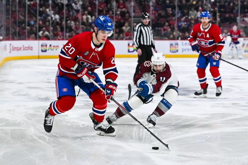 Jan 15, 2024; Montreal, Quebec, CAN; Montreal Canadiens left wing Juraj Slafkovsky (20) plays the puck against Colorado Avalanche center Andrew Cogliano (11) during the third period at Bell Centre. Mandatory Credit: David Kirouac-USA TODAY Sports