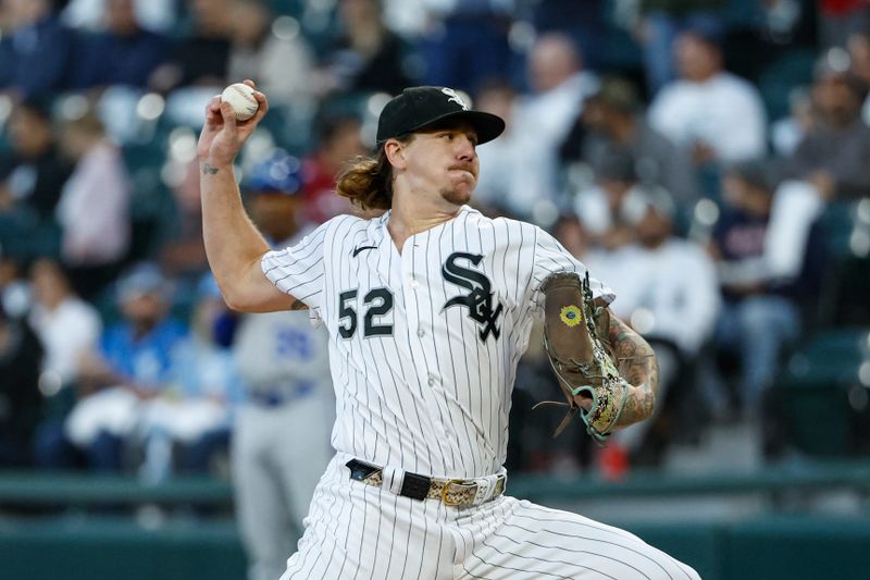 Sep 13, 2023; Chicago, Illinois, USA; Chicago White Sox starting pitcher Mike Clevinger (52) delivers a pitch against the Kansas City Royals during the first inning at Guaranteed Rate Field. Mandatory Credit: Kamil Krzaczynski-USA TODAY Sports