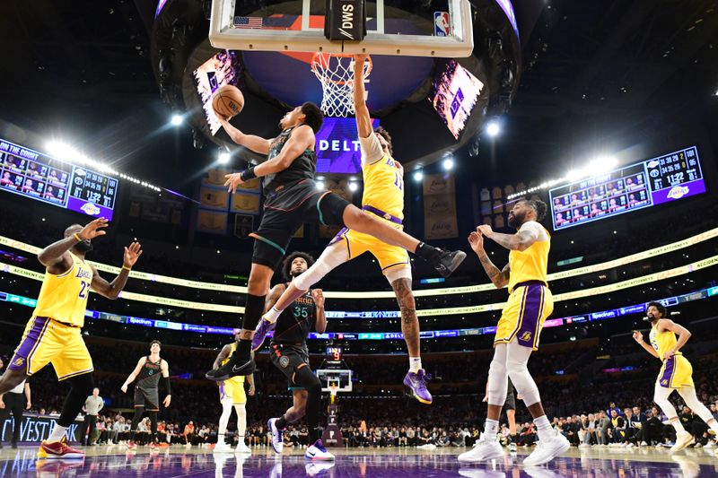 LOS ANGELES, CA - FEBRUARY 29: Jordan Poole #13 of the Washington Wizards drives to the basket during the game against the Los Angeles Lakers on February 29, 2024 at Crypto.Com Arena in Los Angeles, California. NOTE TO USER: User expressly acknowledges and agrees that, by downloading and/or using this Photograph, user is consenting to the terms and conditions of the Getty Images License Agreement. Mandatory Copyright Notice: Copyright 2024 NBAE (Photo by Adam Pantozzi/NBAE via Getty Images)