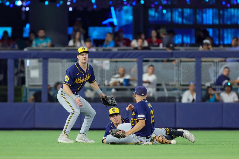 Sep 24, 2023; Miami, Florida, USA; Milwaukee Brewers center fielder Sal Frelick (10) dives but cannot catch a fly ball by Miami Marlins second baseman Xavier Edwards (not pictured) during the fourth inning at loanDepot Park. Mandatory Credit: Sam Navarro-USA TODAY Sports