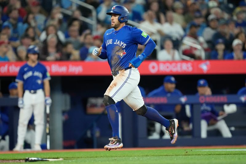 Apr 14, 2024; Toronto, Ontario, CAN; Toronto Blue Jays right fielder George Springer (4) scores on a single hit by  designated hitter Justin Turner (not pictured) during the fifth inning against the Colorado Rockies at Rogers Centre. Mandatory Credit: John E. Sokolowski-USA TODAY Sports