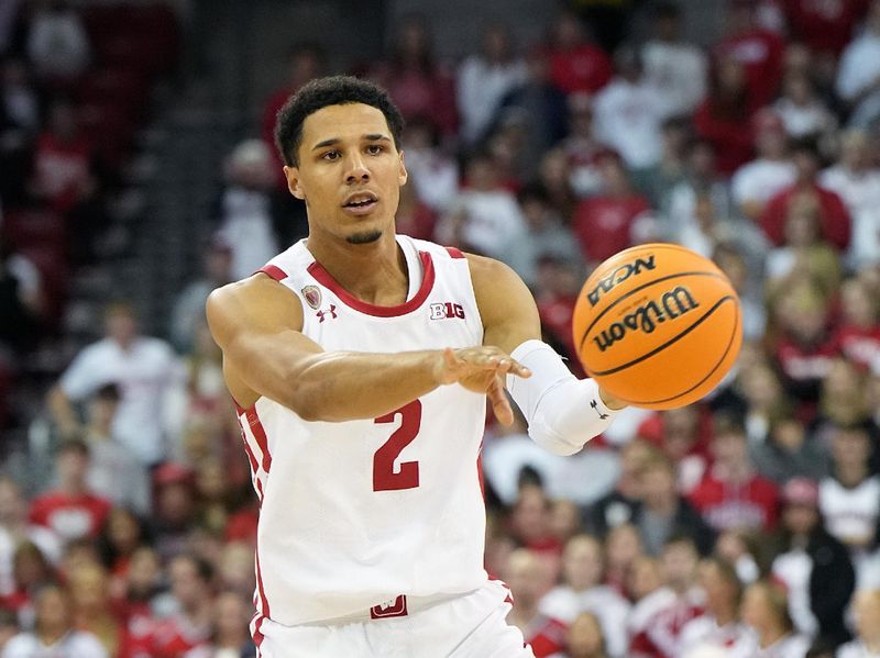 Nov 15, 2022; Madison, Wisconsin, USA; Wisconsin Badgers guard Jordan Davis (2) passes the ball against the Green Bay Phoenix during the second half at the Kohl Center. Mandatory Credit: Kayla Wolf-USA TODAY Sports