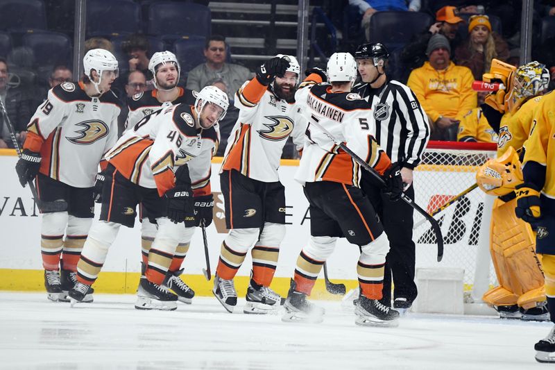 Jan 9, 2024; Nashville, Tennessee, USA; Anaheim Ducks defenseman Radko Gudas (7) celebrates after scoring during the third period against the Nashville Predators at Bridgestone Arena. Mandatory Credit: Christopher Hanewinckel-USA TODAY Sports