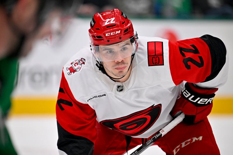 Oct 25, 2025; Dallas, Texas, USA; Carolina Hurricanes center Logan Stankoven (22) looks on during the third period against the Dallas Stars at the American Airlines Center. Mandatory Credit: Jerome Miron-Imagn Images