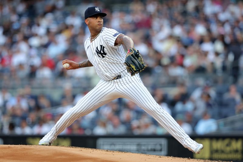 Jul 2, 2024; Bronx, New York, USA; New York Yankees starting pitcher Luis Gil (81) pitches against the Cincinnati Reds during the second inning at Yankee Stadium. Mandatory Credit: Brad Penner-USA TODAY Sports