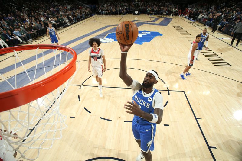 MILWAUKEE, WI - NOVEMBER 30: Bobby Portis #9 of the Milwaukee Bucks drives to the basket during the game against the Washington Wizards on November 30, 2024 at Fiserv Forum Center in Milwaukee, Wisconsin. NOTE TO USER: User expressly acknowledges and agrees that, by downloading and or using this Photograph, user is consenting to the terms and conditions of the Getty Images License Agreement. Mandatory Copyright Notice: Copyright 2024 NBAE (Photo by Gary Dineen/NBAE via Getty Images).