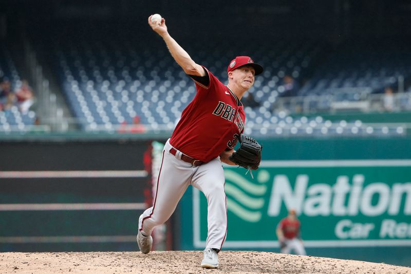 Jun 22, 2023; Washington, District of Columbia, USA; Arizona Diamondbacks relief pitcher Scott McGough (30) throws the ball in the ninth inning against the Washington Nationals at Nationals Park. Mandatory Credit: Amber Searls-USA TODAY Sports