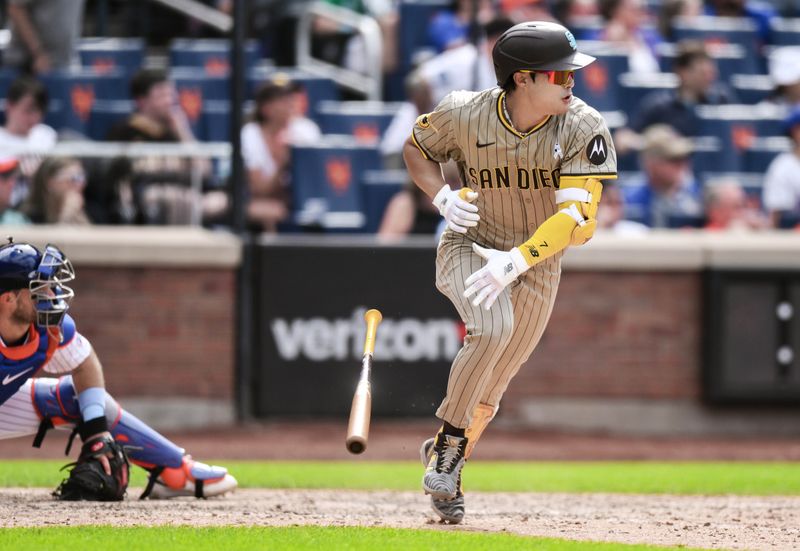 Jun 16, 2024; New York City, New York, USA; San Diego Padres shortstop Ha-Seong Kim (7) hits a RBI double against the New York Mets during the eighth inning at Citi Field. Mandatory Credit: John Jones-USA TODAY Sports