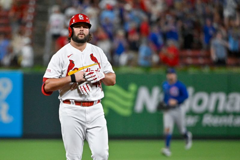 Jul 28, 2023; St. Louis, Missouri, USA;  St. Louis Cardinals pinch hitter Alec Burleson (41) looks on after Chicago Cubs center fielder Mike Tauchman (40) robbed a home run to end the game in the ninth inning at Busch Stadium. Mandatory Credit: Jeff Curry-USA TODAY Sports