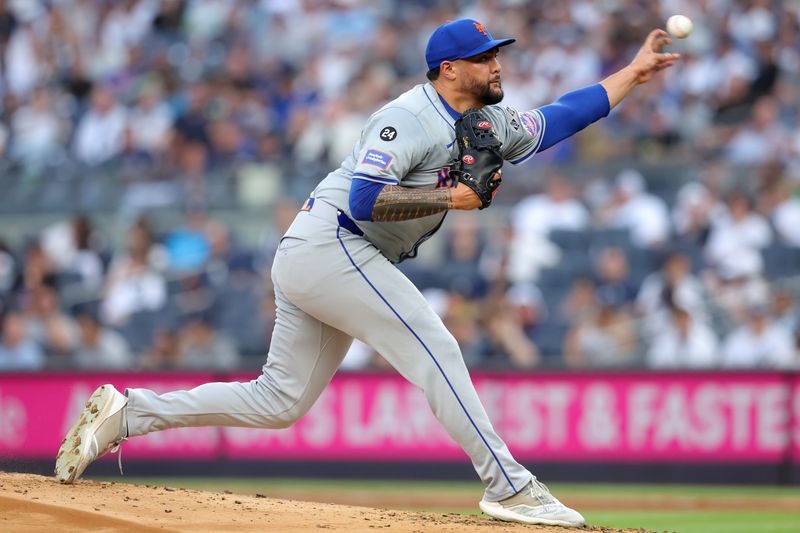 Jul 24, 2024; Bronx, New York, USA; New York Mets starting pitcher Sean Manaea (59) pitches against the New York Yankees during the first inning at Yankee Stadium. Mandatory Credit: Brad Penner-USA TODAY Sports