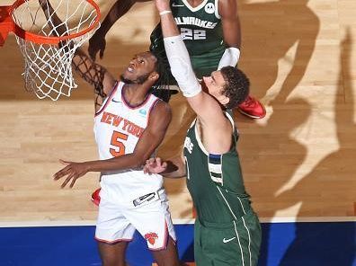 NEW YORK, NY - DECEMBER 25: Immanuel Quickley #5 of the New York Knicks drives to the basket during the game against the Milwaukee Bucks on December 25, 2023 at Madison Square Garden in New York City, New York.  NOTE TO USER: User expressly acknowledges and agrees that, by downloading and or using this photograph, User is consenting to the terms and conditions of the Getty Images License Agreement. Mandatory Copyright Notice: Copyright 2023 NBAE  (Photo by Nathaniel S. Butler/NBAE via Getty Images)