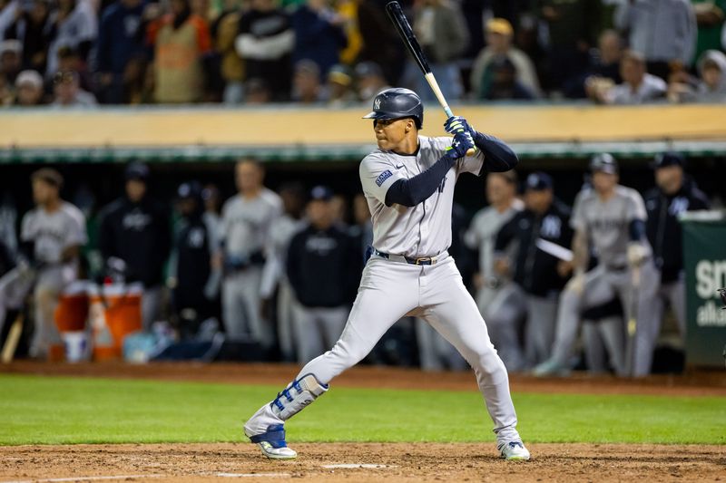 Sep 20, 2024; Oakland, California, USA; New York Yankees outfielder Juan Soto (22) at bat during the tenth inning against the Oakland Athletics at Oakland-Alameda County Coliseum. Mandatory Credit: Bob Kupbens-Imagn Images