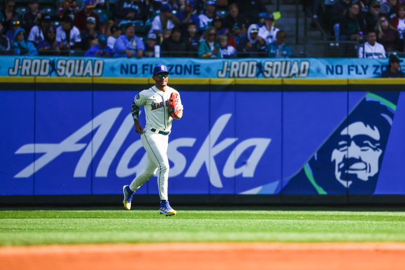 Oct 1, 2023; Seattle, Washington, USA; Seattle Mariners center fielder Julio Rodriguez (44) returns to the dugout following the second inning against the Texas Rangers at T-Mobile Park. Mandatory Credit: Joe Nicholson-USA TODAY Sports