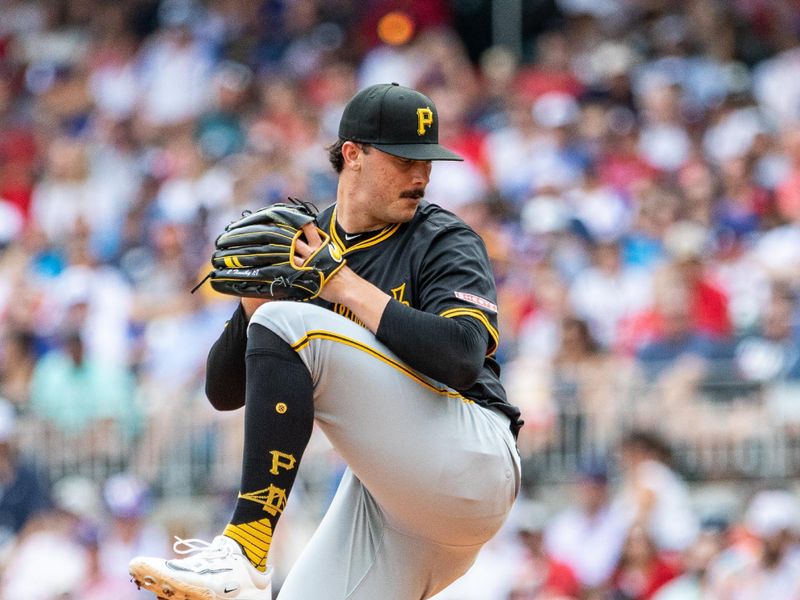 Jun 29, 2024; Cumberland, Georgia, USA; Pittsburgh Pirates pitcher Paul Skenes (30) pitches the ball against Atlanta Braves during the second inning at Truist Park. Mandatory Credit: Jordan Godfree-USA TODAY Sports