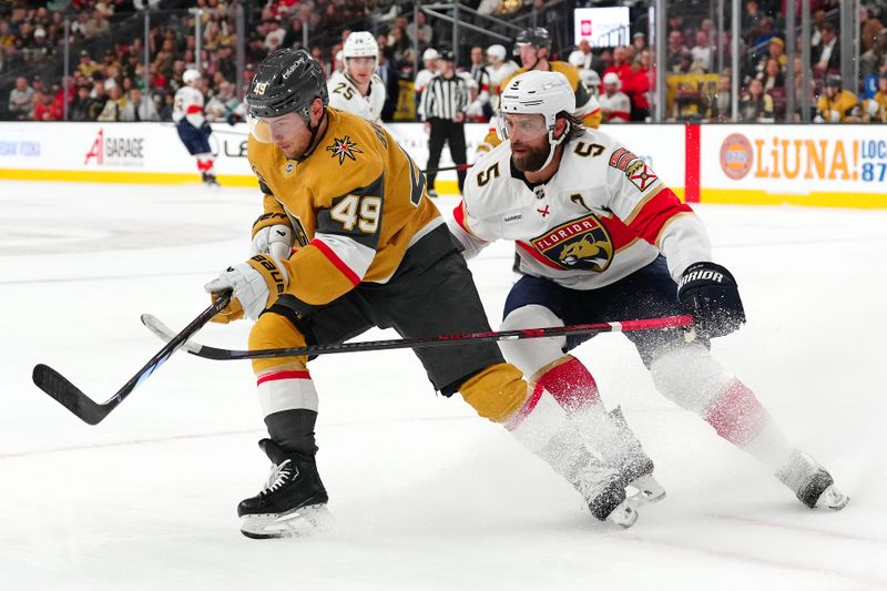 Jan 26, 2025; Las Vegas, Nevada, USA; Vegas Golden Knights center Ivan Barbashev (49) skates ahead of Florida Panthers defenseman Aaron Ekblad (5) during the second period at T-Mobile Arena. Mandatory Credit: Stephen R. Sylvanie-Imagn Images