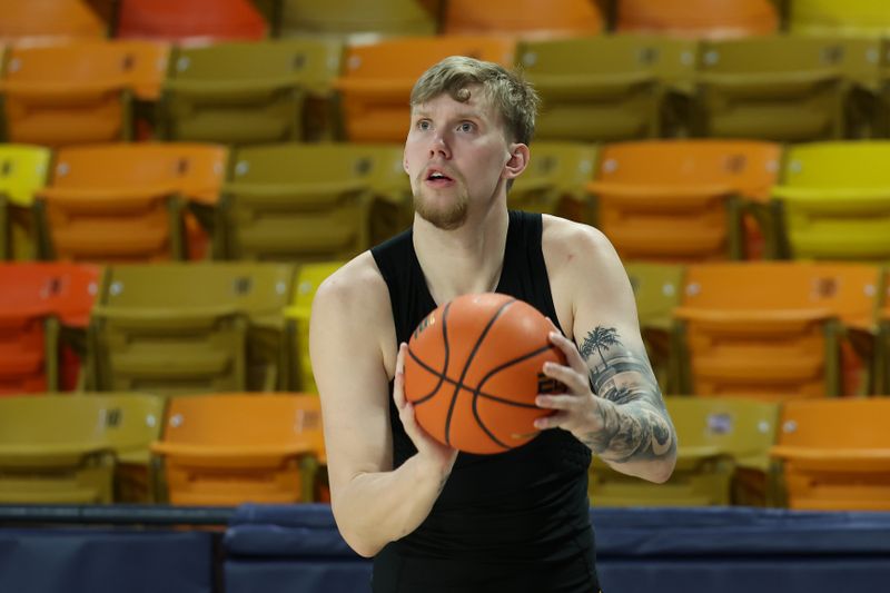 Jan 30, 2024; Logan, Utah, USA; San Jose State Spartans forward William Humer (21) warms up before the game against the Utah State Aggies at Dee Glen Smith Spectrum. Mandatory Credit: Rob Gray-USA TODAY Sports