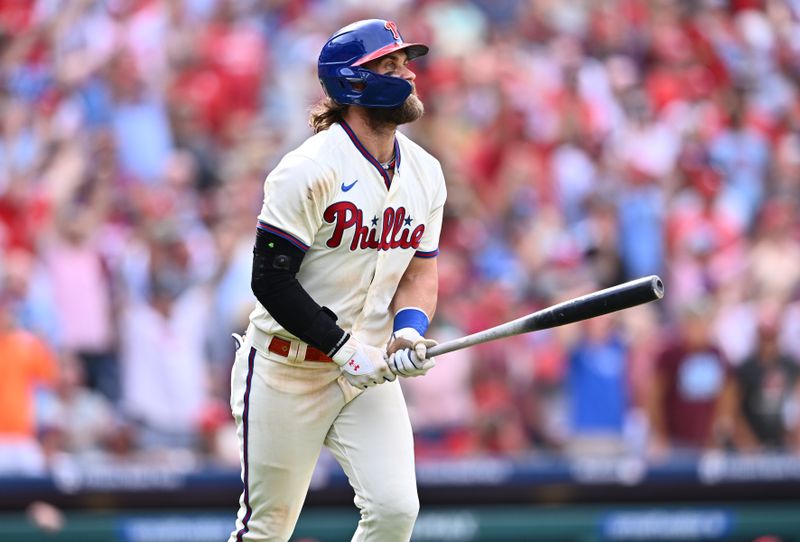 Aug 30, 2023; Philadelphia, Pennsylvania, USA; Philadelphia Phillies first baseman Bryce Harper (3) watches after hitting a two-run home run against the Los Angeles Angels in the eighth inning at Citizens Bank Park. Mandatory Credit: Kyle Ross-USA TODAY Sports