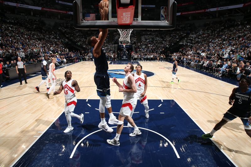 MINNEAPOLIS, MN -  OCTOBER 26: Rudy Gobert #27 of the Minnesota Timberwolves dunks the ball during the game against the Toronto Raptors on October 26, 2024 at Target Center in Minneapolis, Minnesota. NOTE TO USER: User expressly acknowledges and agrees that, by downloading and or using this Photograph, user is consenting to the terms and conditions of the Getty Images License Agreement. Mandatory Copyright Notice: Copyright 2024 NBAE (Photo by David Sherman/NBAE via Getty Images)