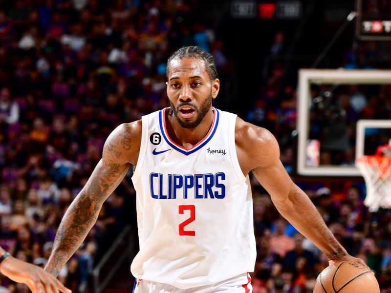 PHOENIX, AZ - APRIL 18: Kawhi Leonard #2 of the LA Clippers dribbles the ball during the game against the Phoenix Suns during Round 1 Game 2 of the 2023 NBA Playoffs on April 18, 2023 at Footprint Center in Phoenix, Arizona. NOTE TO USER: User expressly acknowledges and agrees that, by downloading and or using this photograph, user is consenting to the terms and conditions of the Getty Images License Agreement. Mandatory Copyright Notice: Copyright 2023 NBAE (Photo by Barry Gossage/NBAE via Getty Images)