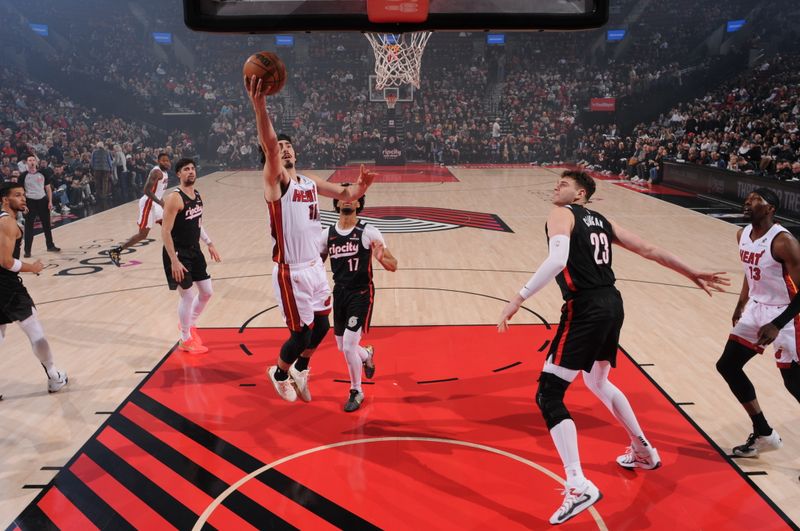 PORTLAND, OR - JANUARY 11:  Jaime Jaquez Jr. #11 of the Miami Heat shoots the ball during the game against the Portland Trail Blazers on January 11, 2025 at the Moda Center Arena in Portland, Oregon. NOTE TO USER: User expressly acknowledges and agrees that, by downloading and or using this photograph, user is consenting to the terms and conditions of the Getty Images License Agreement. Mandatory Copyright Notice: Copyright 2025 NBAE (Photo by Cameron Browne/NBAE via Getty Images)