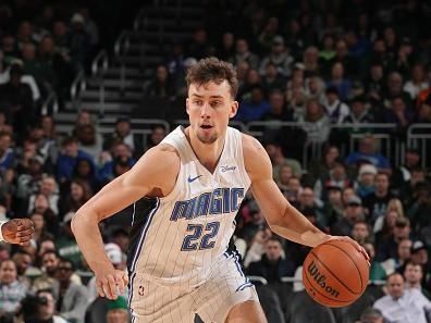 MILWAUKEE, WI - DECEMBER 21:  Franz Wagner #22 of the Orlando Magic handles the ball during the game against the Milwaukee Bucks on December 21, 2023 at the Fiserv Forum Center in Milwaukee, Wisconsin. NOTE TO USER: User expressly acknowledges and agrees that, by downloading and or using this Photograph, user is consenting to the terms and conditions of the Getty Images License Agreement. Mandatory Copyright Notice: Copyright 2023 NBAE (Photo by Gary Dineen/NBAE via Getty Images).