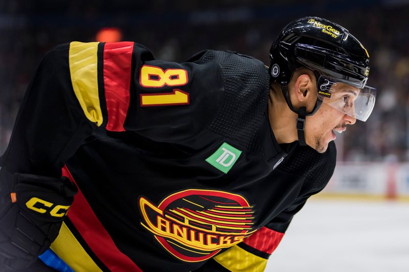 Feb 13, 2023; Vancouver, British Columbia, CAN; Vancouver Canucks forward Dakota Joshua (81) prepares for a face off against the Detroit Red Wings in the first period at Rogers Arena. Mandatory Credit: Bob Frid-USA TODAY Sports