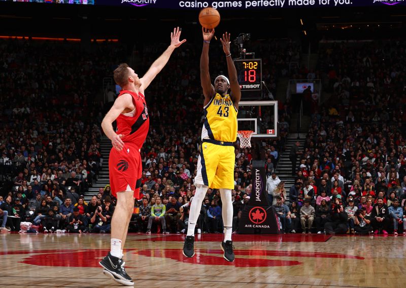 TORONTO, CANADA - FEBRUARY 14: Pascal Siakam #43 of the Indiana Pacers shoots a three point basket during the game against the Toronto Raptors  on February 14, 2024 at the Scotiabank Arena in Toronto, Ontario, Canada.  NOTE TO USER: User expressly acknowledges and agrees that, by downloading and or using this Photograph, user is consenting to the terms and conditions of the Getty Images License Agreement.  Mandatory Copyright Notice: Copyright 2024 NBAE (Photo by Vaughn Ridley/NBAE via Getty Images)