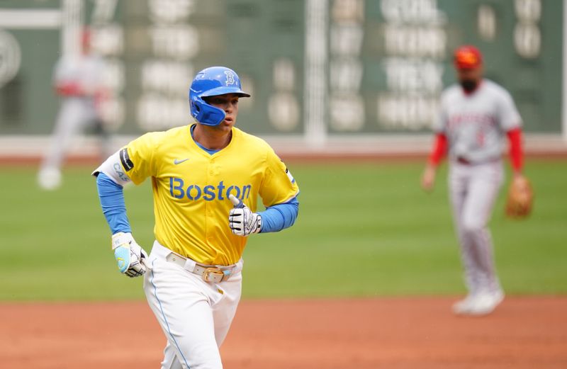 Apr 14, 2024; Boston, Massachusetts, USA; Boston Red Sox first baseman Triston Casas (36) rounds the bases after hitting a home run against tech Los Angeles Angels in the first inning at Fenway Park. Mandatory Credit: David Butler II-USA TODAY Sports