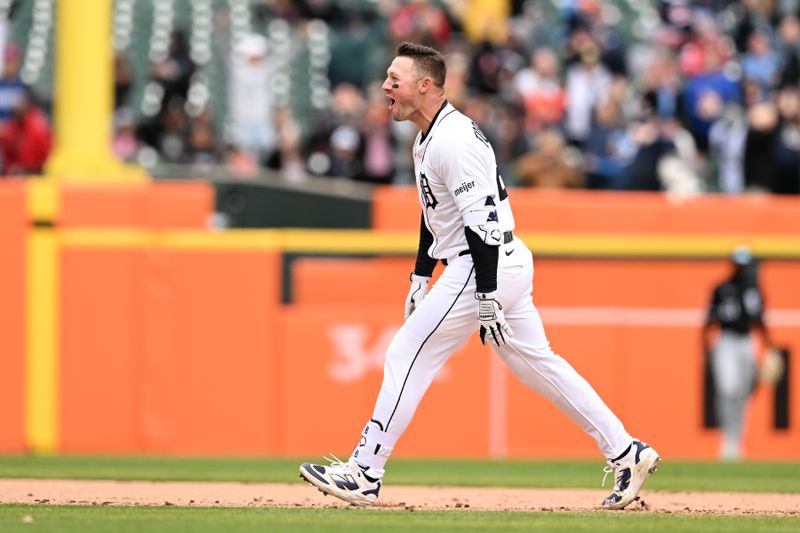 Apr 6, 2025; Detroit, Michigan, USA;  Detroit Tigers first baseman Spencer Torkelson (20) starts to celebrate as he runs toward his teammates after hitting a game-winning two-run walk off double against the Chicago White Sox in the ninth inning at Comerica Park. Mandatory Credit: Lon Horwedel-Imagn Images