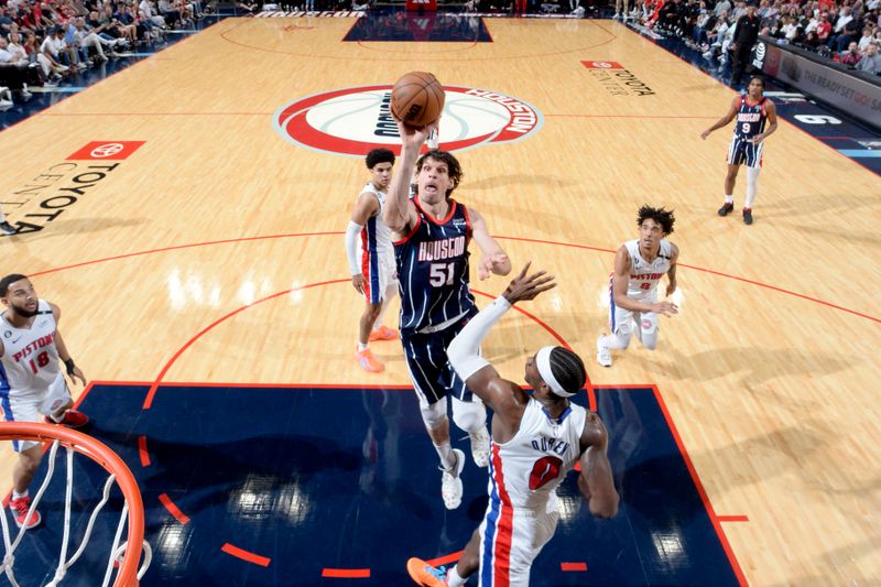 HOUSTON, TX - MARCH 31: Boban Marjanovic #51 of the Houston Rockets goes to the basket against the Detroit Pistons on March 31, 2023 at the Toyota Center in Houston, Texas. NOTE TO USER: User expressly acknowledges and agrees that, by downloading and or using this photograph, User is consenting to the terms and conditions of the Getty Images License Agreement. Mandatory Copyright Notice: Copyright 2023 NBAE (Photo by Logan Riely/NBAE via Getty Images)